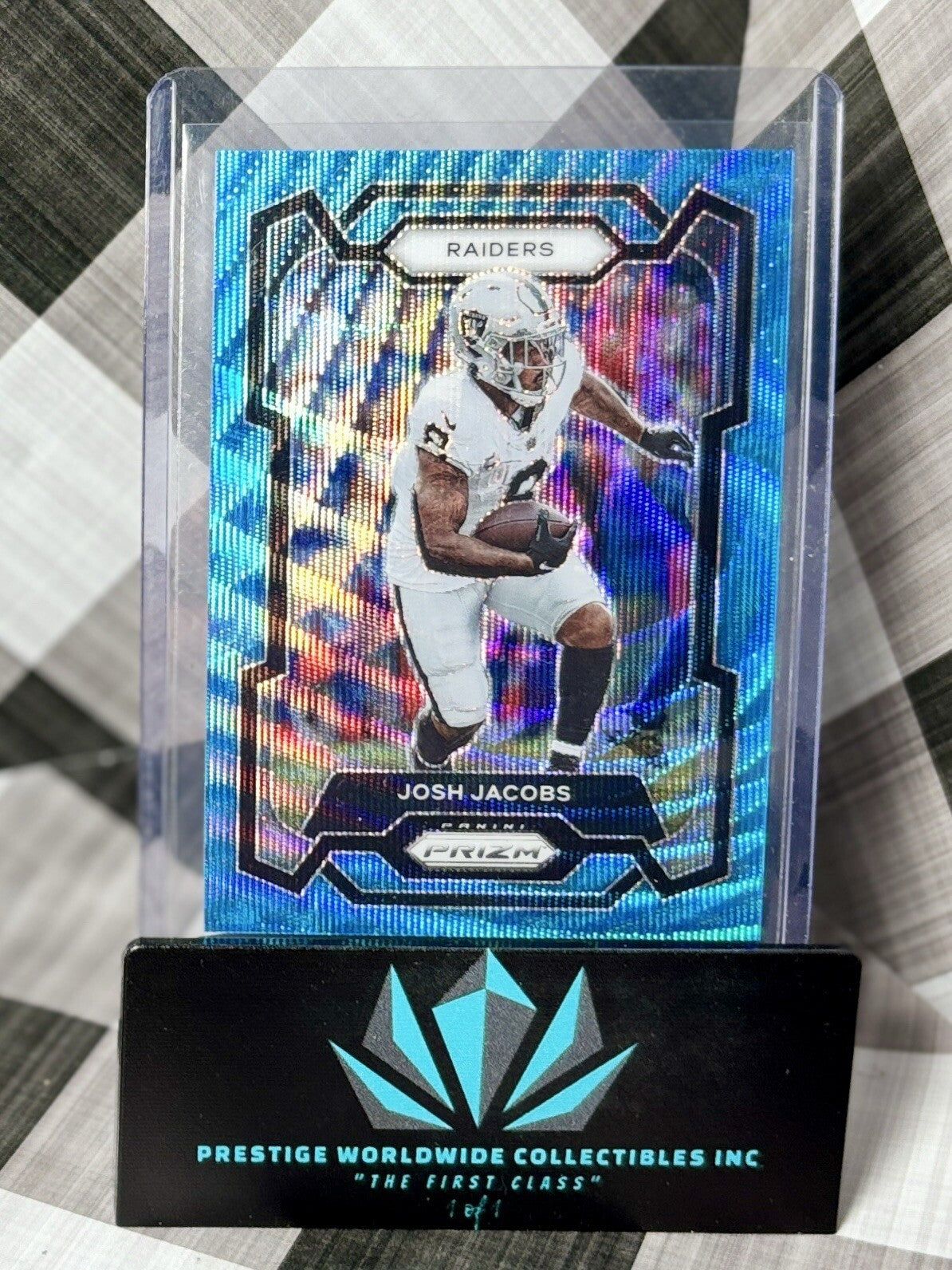 Josh Jacobs 2023 Panini Prizm Blue Wave Prizm /199 #178 LV Raiders & GB Packers