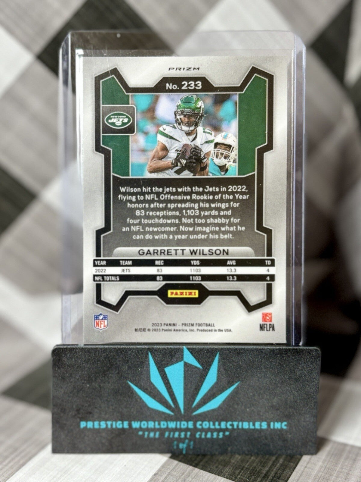 Garrett Wilson 2023 Panini Prizm Orange Cracked Ice #233 New York Jets