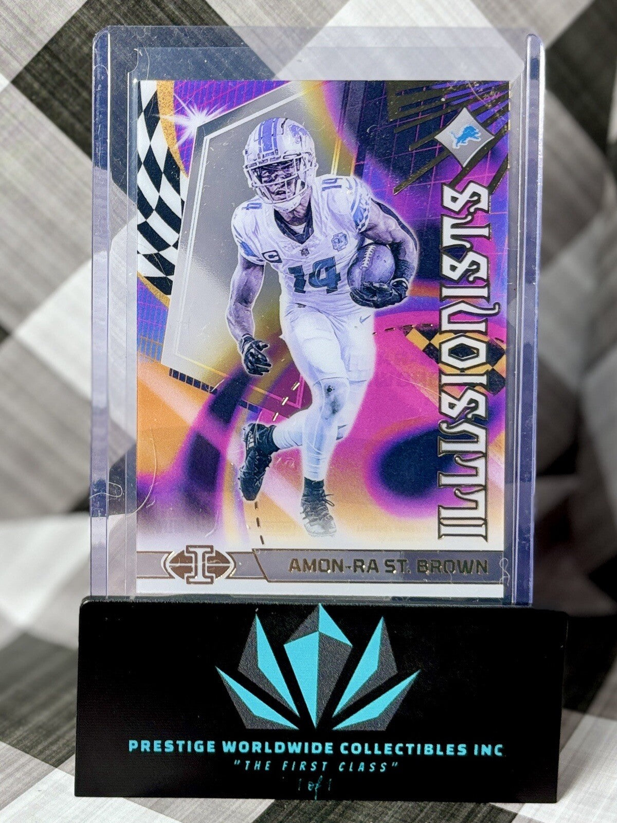 Amon-Ra St. Brown 2023 Panini Illusions Illusionists Acetate #1 Detroit Lions